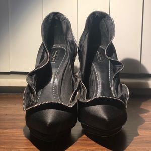 Report Signature Watts Ruffle Zipper Pumps